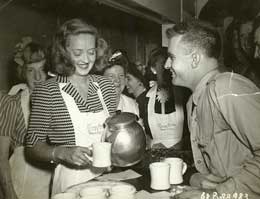 Bette Davis pouring coffee at Hollywood Canteen