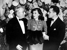 Louis B. Mayer, Paulette Goddard and director George at the premiere of The Women