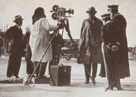 F.W. Murnau directing Der Letzte Mann. Legendary Karl Freund at camera