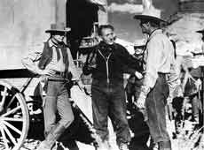 Lang directs Robert Young and Randolph Scott on Western Union (1941)