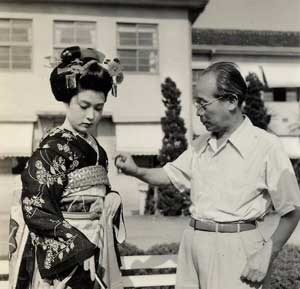 Mizoguchi directing Ayako Wakao in a scene of Gion bayashi (1953)