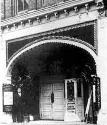 The Cascade Theater in Newcastle, Pennsylvania was the first nickelodeon acquired by Jack, Albert, Sam, and Harry Warner. A sign promises 'Refined Entertainment for Ladies, Gentlemen, and Children.' The Warners went on to careers in exhibition and production, eventually establishing Warner Bros.