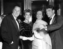 Carol Reed in 1956, with Kay Kendall (soon to be Mrs Rex Harrison), his wife Penelope Dudley-Ward, and Burt Lancaster.