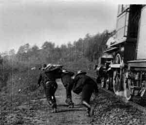 Porter used revolutionary techniques of dramatic film editing in The Great Train Robbery (1903). The camera follows the escaping outlaws in scene 7.